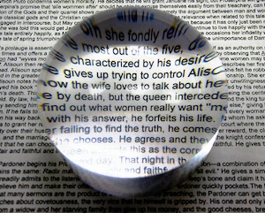 A magnifying glass over text.